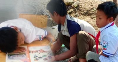 Cậu bé vùng cao bị lệch xương sống phải nằm bò ra bàn học bài, đi bộ 8km đến trường