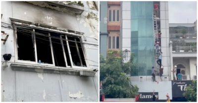 Nhà trọ 5 tầng bốc cháy, người dân đu thang ra ngoài