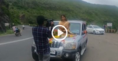 Video: Cô dâu ngồi trên nắp ca-pô ôtô đến nơi tổ chức đám cưới