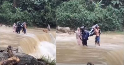 Video: Mưa lớn sạt lở nhiều nơi ở Quảng Nam, người dân khiêng xe máy vượt lũ dữ