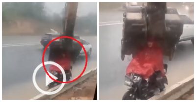Clip: Tài xế dùng gàu xúc che mưa cho người đi xe máy
