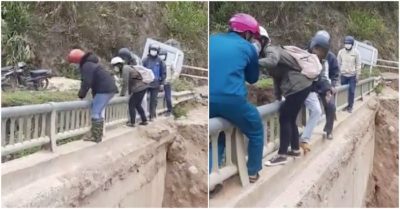 Người dân Quảng Nam liều mình bám lan can cầu vượt sông