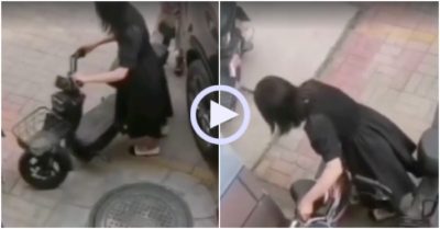 Video: Cô gái chật vật dắt xe đạp điện ‘rời chuồng’