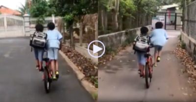 Video: Hai cậu bé ‘song kiếm hợp bích’ đạp xe
