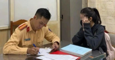 Nữ sinh vừa lái xe vừa xem TikTok bị phạt 1,4 triệu đồng: