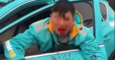 Điều tra vụ tài xế xe ôm công nghệ bị hành hung giữa đường ở Hà Nội