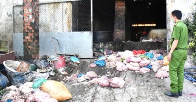 Phát hiện cơ sở chế biến mỡ trái phép nằm trong khu vực nghĩa trang