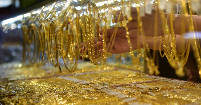 Giá vàng thế giới: Khả năng vượt mốc 5.000 USD nhờ tín hiệu hạ nhiệt xung đột